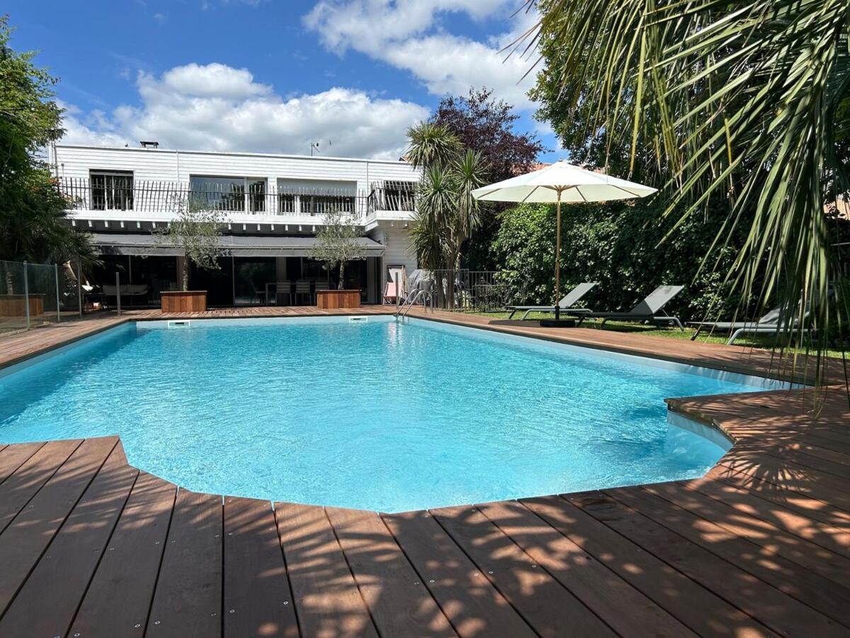 Family In With Large Pool